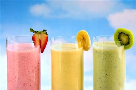 Glasses of Strawberry, Banana and Kiwi Yogurt Smoothies