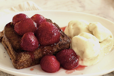 Eggs and strawberries on french toast