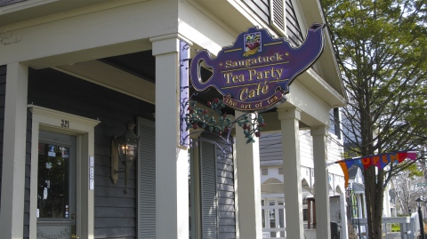 Sign in front of the Saugatuck Tea Party Cafe in Saugatuck, Michigan