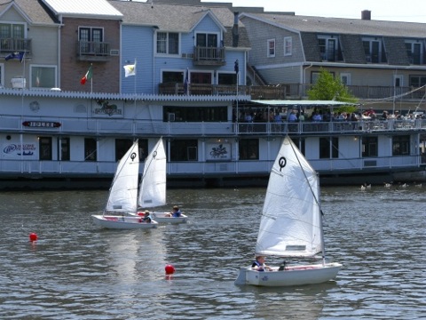 Young kids in a sailing race on the Black River in South Haven, MI