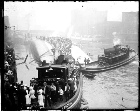 Survivors being shuttled ashore via tugboat from People working to pull the living and the dead from the capsized SS Eastland - 1915