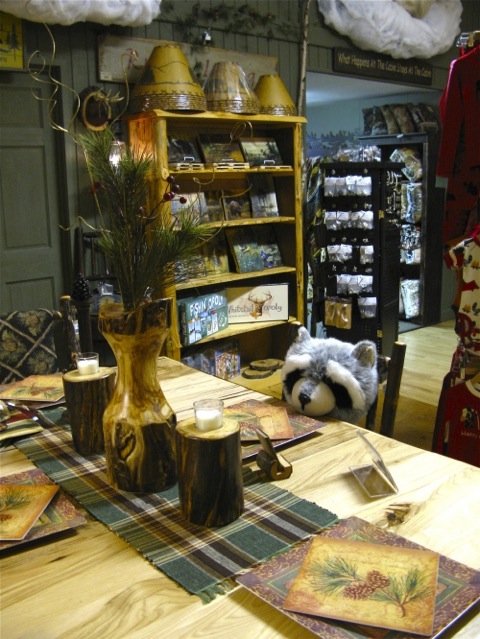 Interior of Northern Rustics with dining table and a stuffed raccoon - Holland, Michigan
