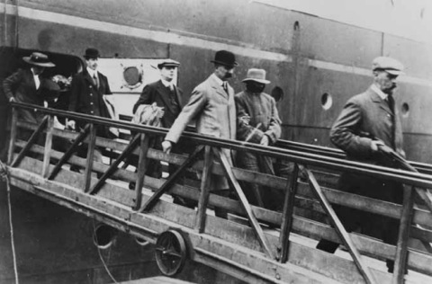 Inspector Dew leading the murderer Crippen down the gangplank of the Laurentic