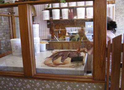 Kilwin's fudge being paddled and cooled on a stone slab