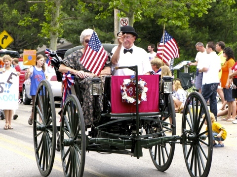Old horseless carriage in the 4th of July parade in Saugatuck, Michigan