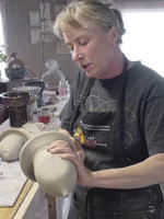 Photo of Lee McKee working clay - Lake Effect Pottery - Fennville, Michigan